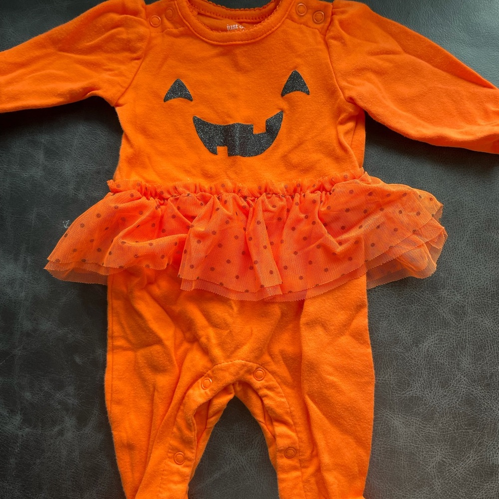 Adorable footed, skirted pumpkin sleep and play